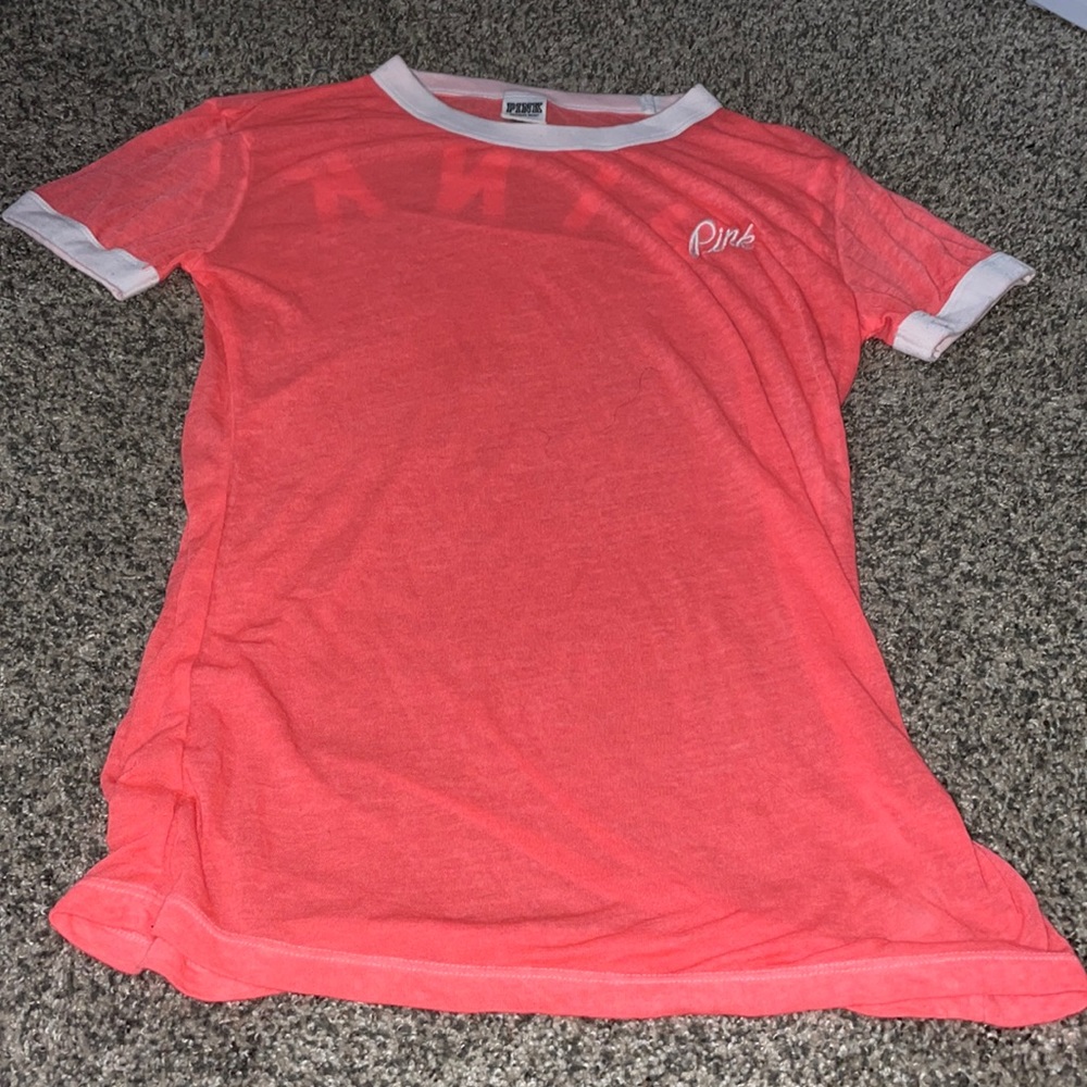 Slightly see through PINK T-shirt. Size XS.